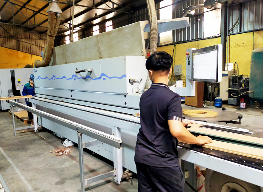 Máy dán cạnh gỗ ván ép tự động tại Hải Phòng